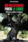 Un palestinese porta la croce. Minoranza cattolica in Palestina