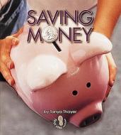 Saving Money di Tanya Thayer edito da Lerner Publications