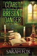 Claret And Present Danger di Sarah Fox edito da Kensington Publishing