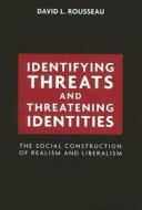Identifying Threats and Threatening Identities di David L. Rousseau edito da Stanford University Press