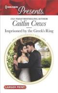 Imprisoned by the Greek's Ring di Caitlin Crews edito da Harlequin Presents Large Print