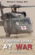 A Doctor Looks At War di Michael C Hodges edito da Tate Publishing & Enterprises
